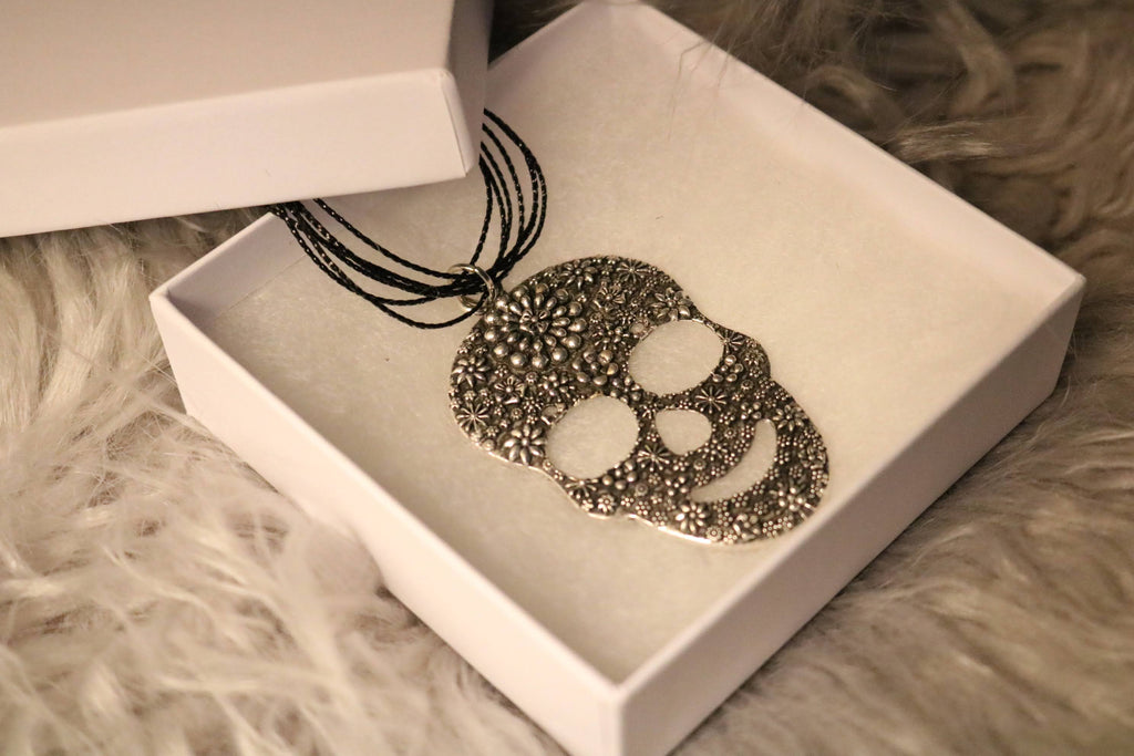 Silver Skull Pendant necklace on a multi-strand chain